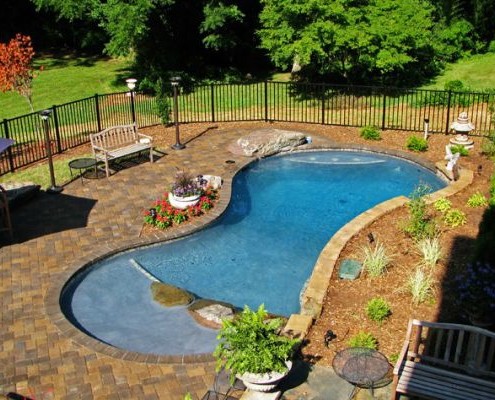 Swimming pools, landscapes, patios, walls, and more by Land Tech in ...